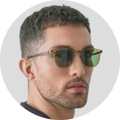 a man wearing sunglasses and a black shirt