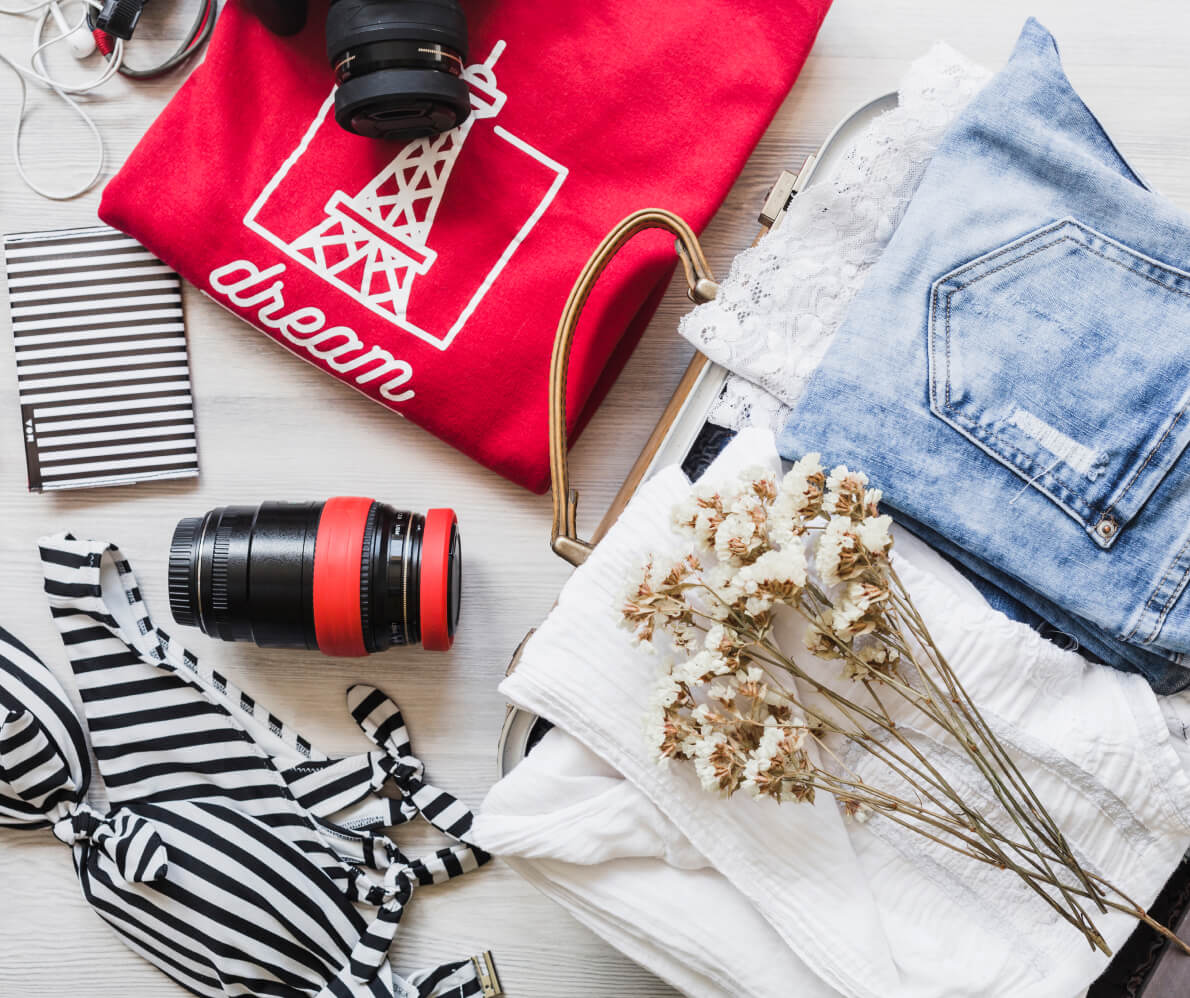 The contents of a women's clothing laid out on a table.